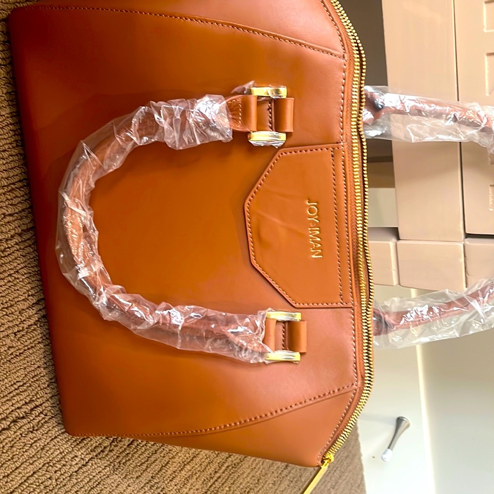 Leather handbag with removable satchel